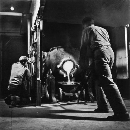 Bullion furnace pouring a gold brick at Giant Mine, 1952. (George Hunter Collection)