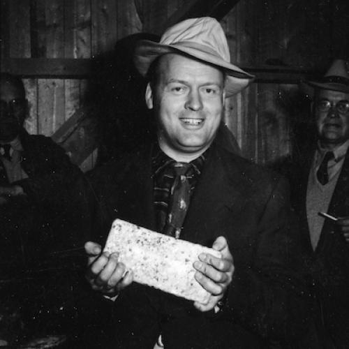 The first gold brick poured at Giant Mine, August 24, 1948. (Giant Mine Collection)