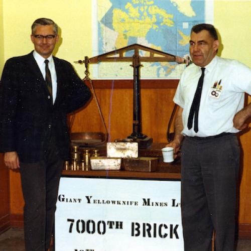 Giant Mine's 7000th gold brick in 1970. Dave Emery and Bob Borden. (Giant Mine Collection)