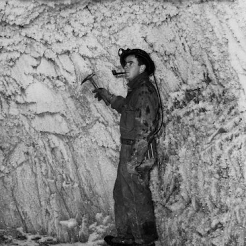 Geologist Jim Harquil examines permafrost at Giant Mine, 1949. (Giant Mine Collection)
