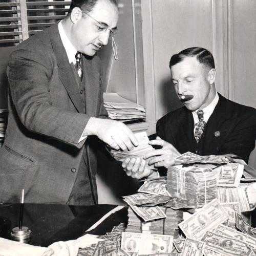 Prospector Spud Arsenault sells his claims in 1946 (YK Press Images Collection)